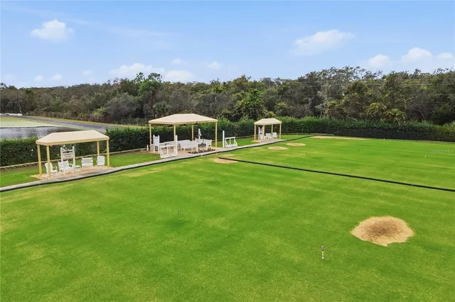 an aerial view of a house with a garden