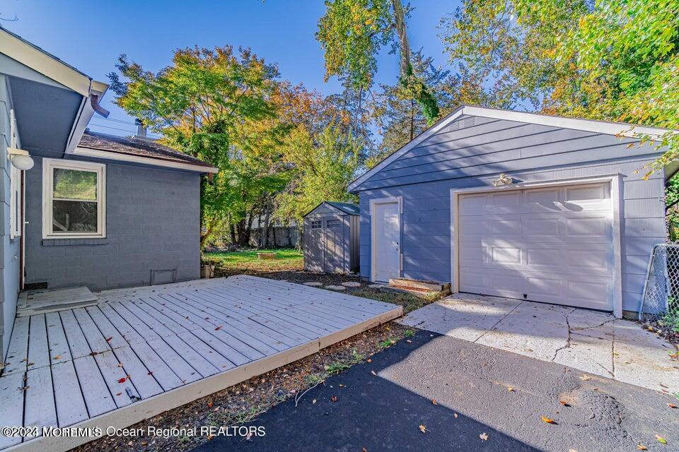 1 Dolphin Way Waretown, NJ 08758 - Photo 3 of 15 a view of backyard with a deck and wooden floor