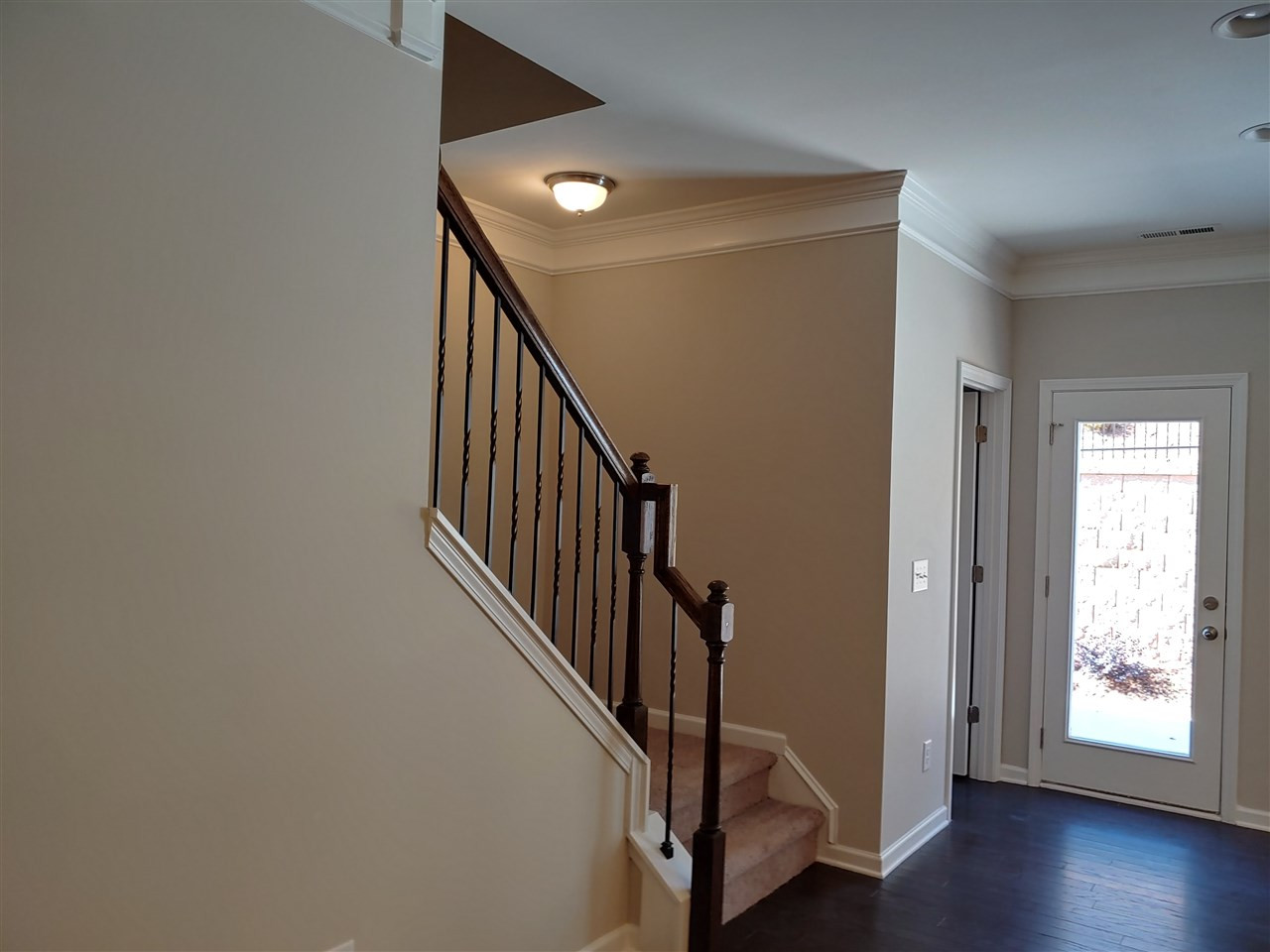 1204 Wingstem Place, Unit 2 Raleigh, NC 27607 - Photo 9 of 23 Upgraded beautiful Open Rail Staircase