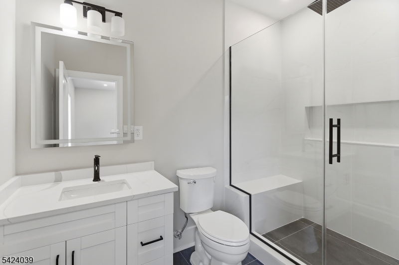 45 Kildee Road Belle Mead, NJ 08502 - Photo 20 of 43 a bathroom with a sink a toilet and shower