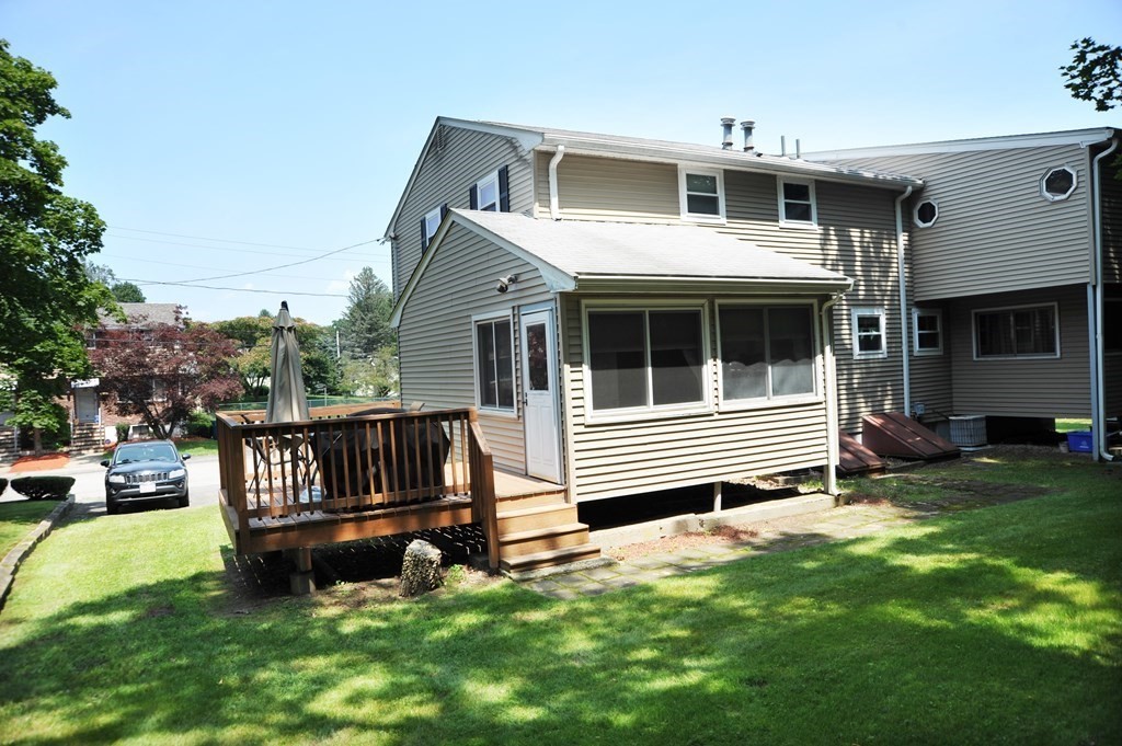 37 Raechel Road, Unit 37 Randolph, MA 02368 - Photo 3 of 15 a house view with a backyard