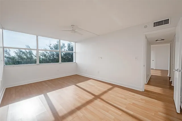 a view of an empty room and window