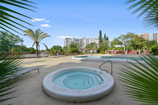 a view of a swimming pool with a terrace