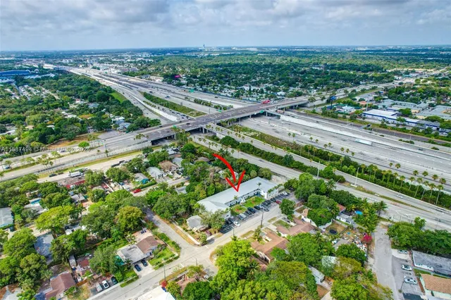 a car parked in front of a house