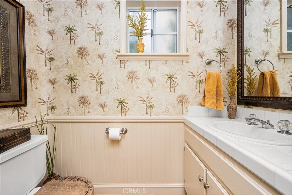 2370 Tryall Tustin, CA 92782 - Photo 14 of 36 a bathroom with a sink and a mirror