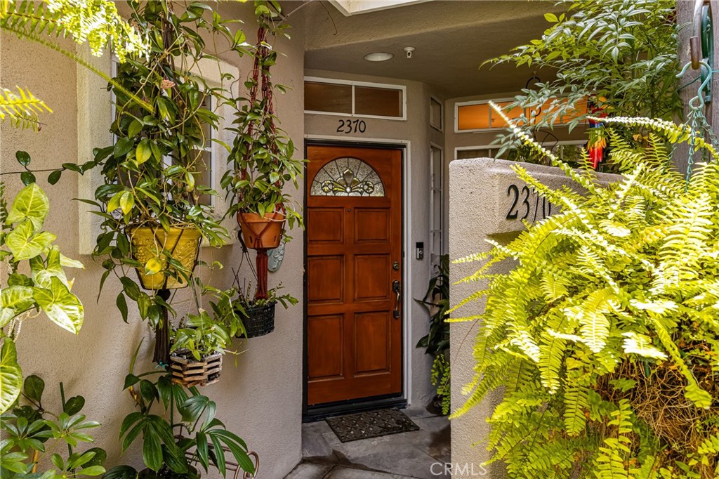 2370 Tryall Tustin, CA 92782 - Photo 2 of 36 a view of a door with a flower pot