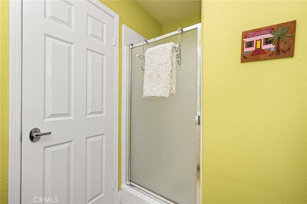 2370 Tryall Tustin, CA 92782 - Photo 25 of 36 a bathroom with a shower and a shower