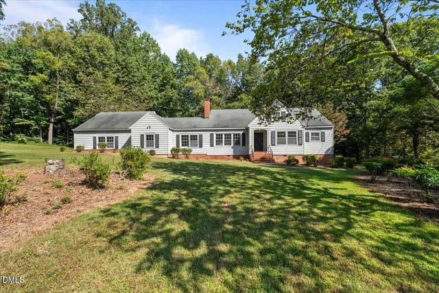 a house view with a garden space