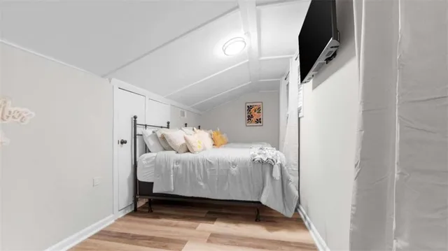 a room with a desk and mirror