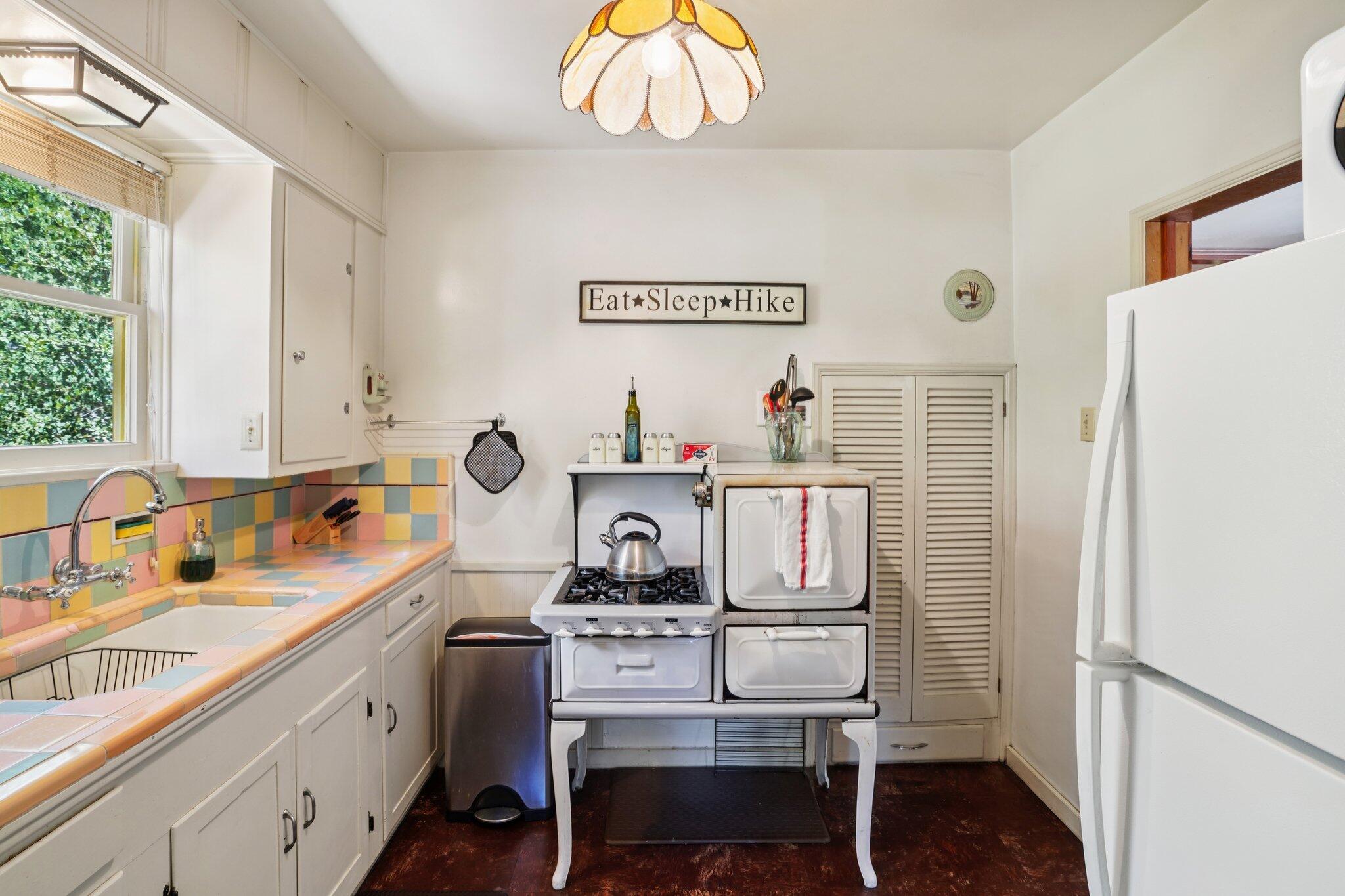 55280 Circle Way Idyllwild, CA 92549 - Photo 12 of 27 a kitchen with a sink cabinets and window