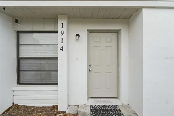 a door view with a wooden door