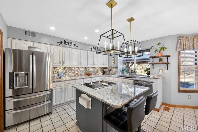 $550,000 | 411 Savannah Ridge Drive, St. Charles, MO 63303
