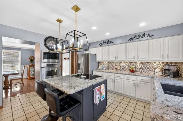 $550,000 | 411 Savannah Ridge Drive, St. Charles, MO 63303