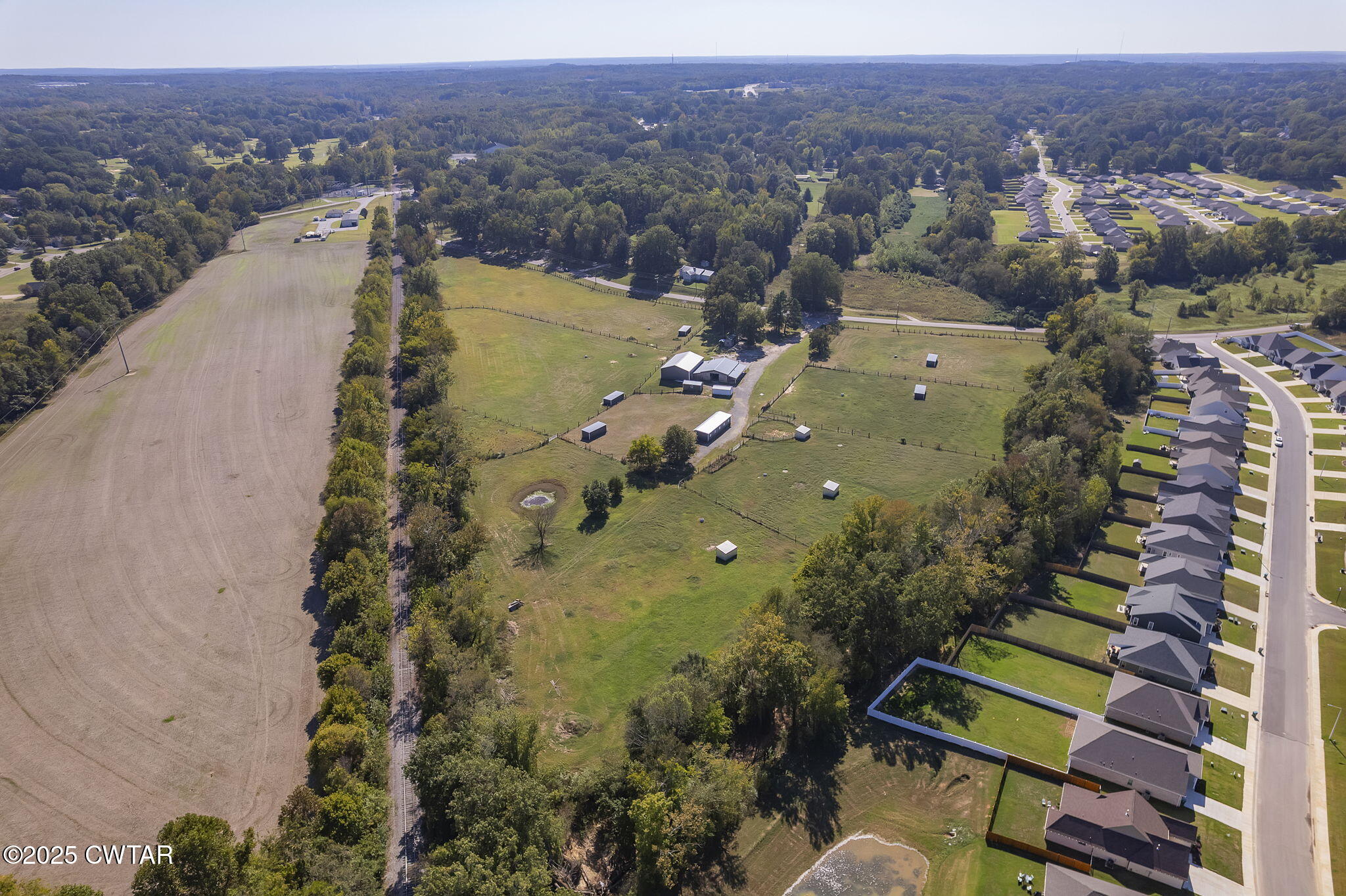 130 Cooper Anderson Road Jackson, TN 38305 - Photo 13 of 46 an aerial view of a houses with a lake