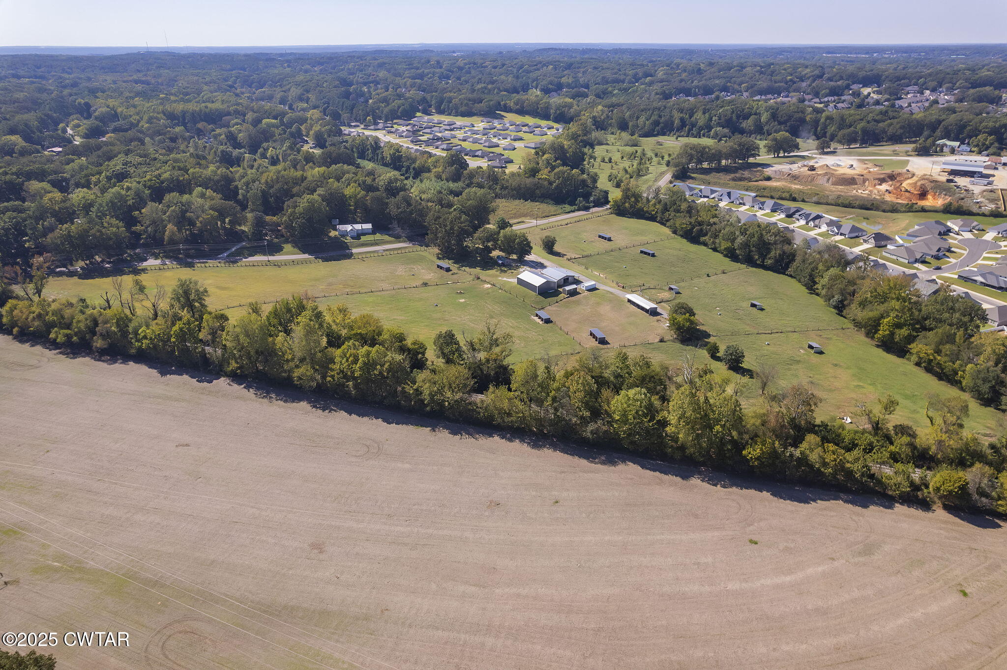 130 Cooper Anderson Road Jackson, TN 38305 - Photo 16 of 46 an aerial view of a city