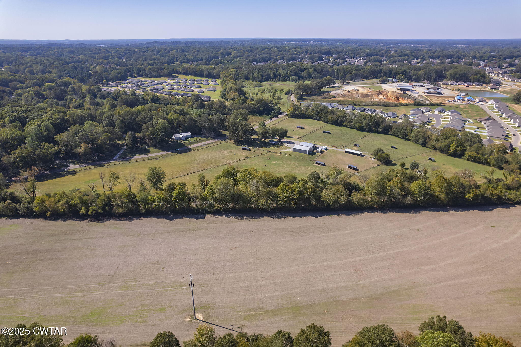 130 Cooper Anderson Road Jackson, TN 38305 - Photo 17 of 46 a view of a lake with mountains in the background
