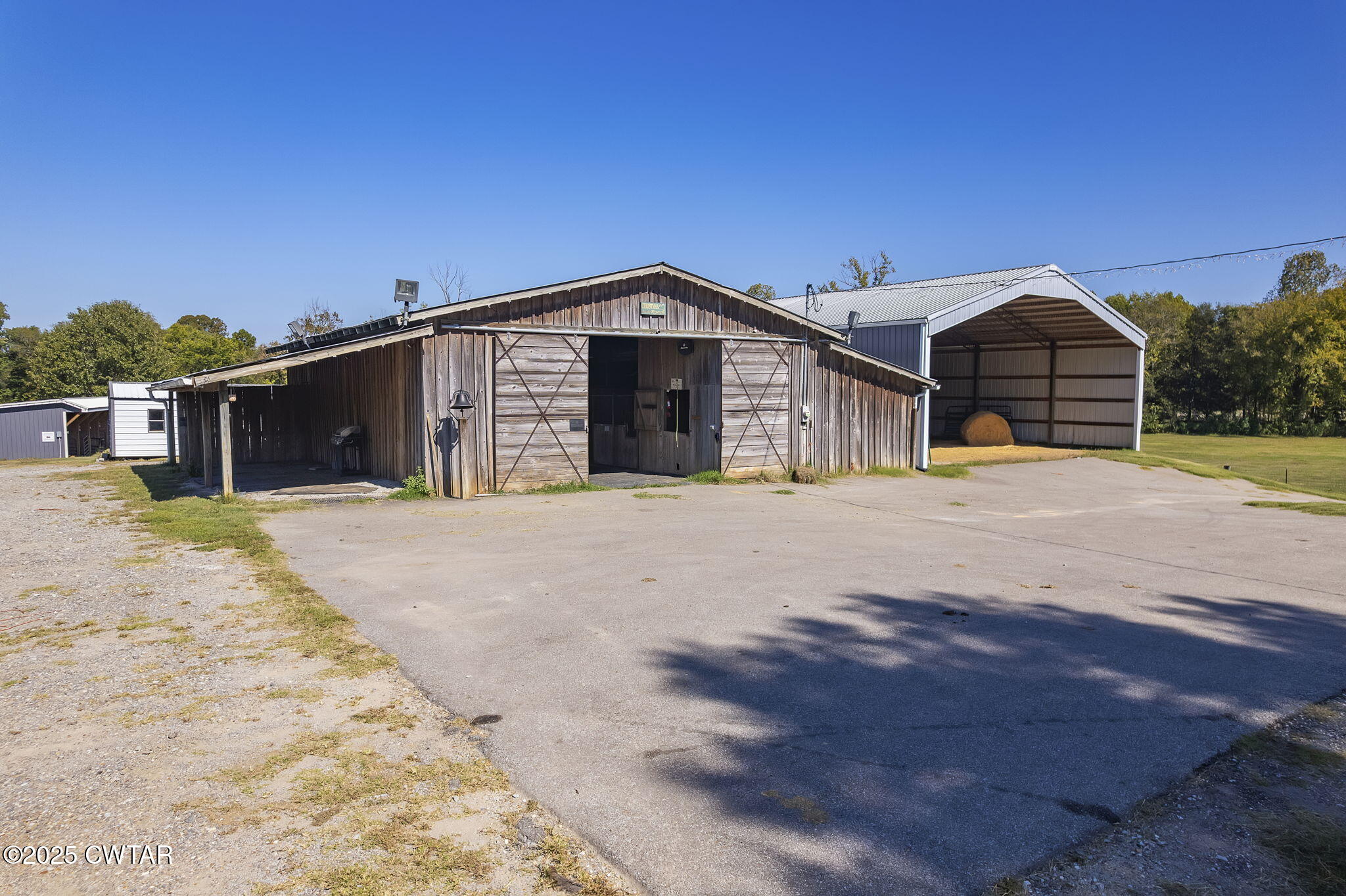 130 Cooper Anderson Road Jackson, TN 38305 - Photo 2 of 46 a view of a house with a yard