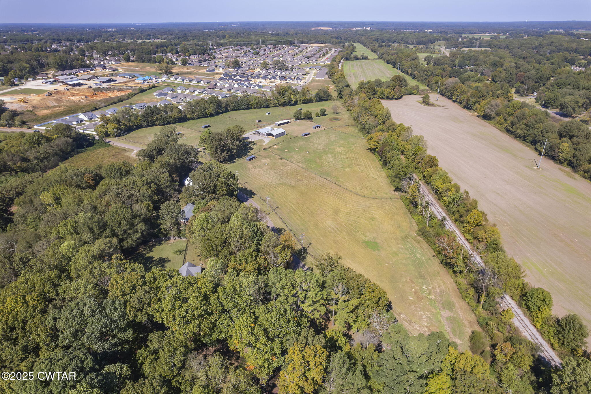 130 Cooper Anderson Road Jackson, TN 38305 - Photo 22 of 46 an aerial view of a houses with a yard