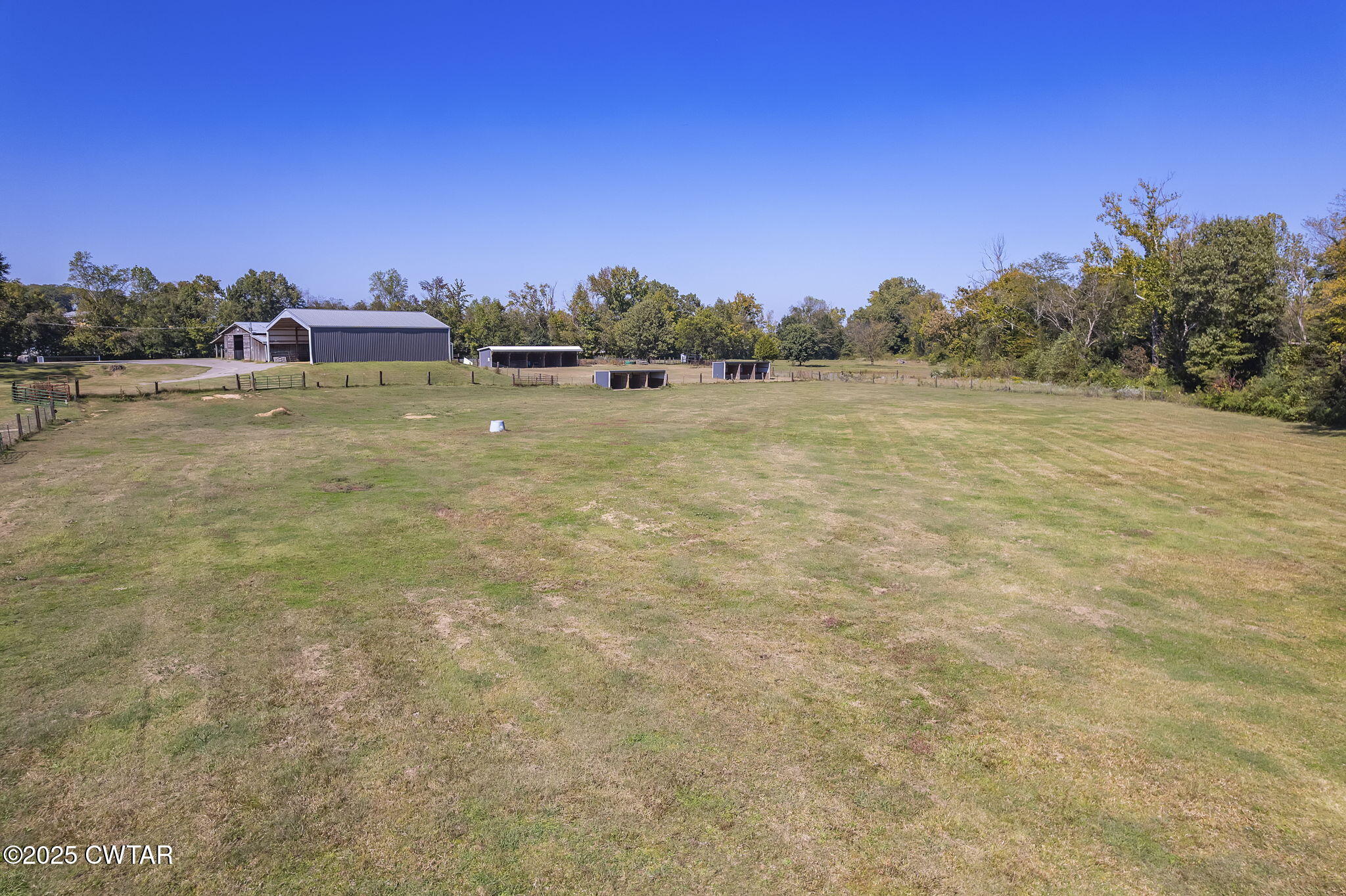 130 Cooper Anderson Road Jackson, TN 38305 - Photo 27 of 46 a view of a lake with sunset