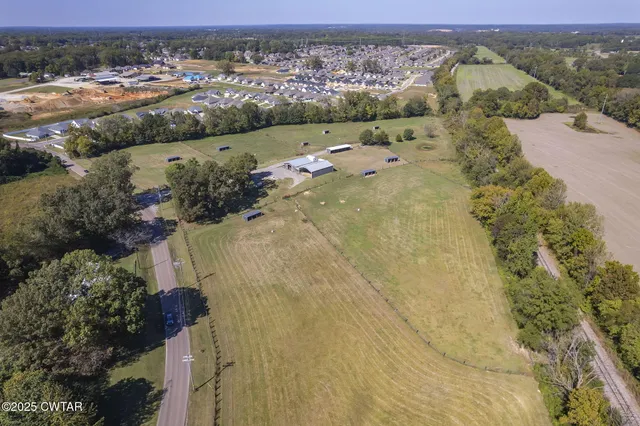 a view of a swimming pool with a balcony