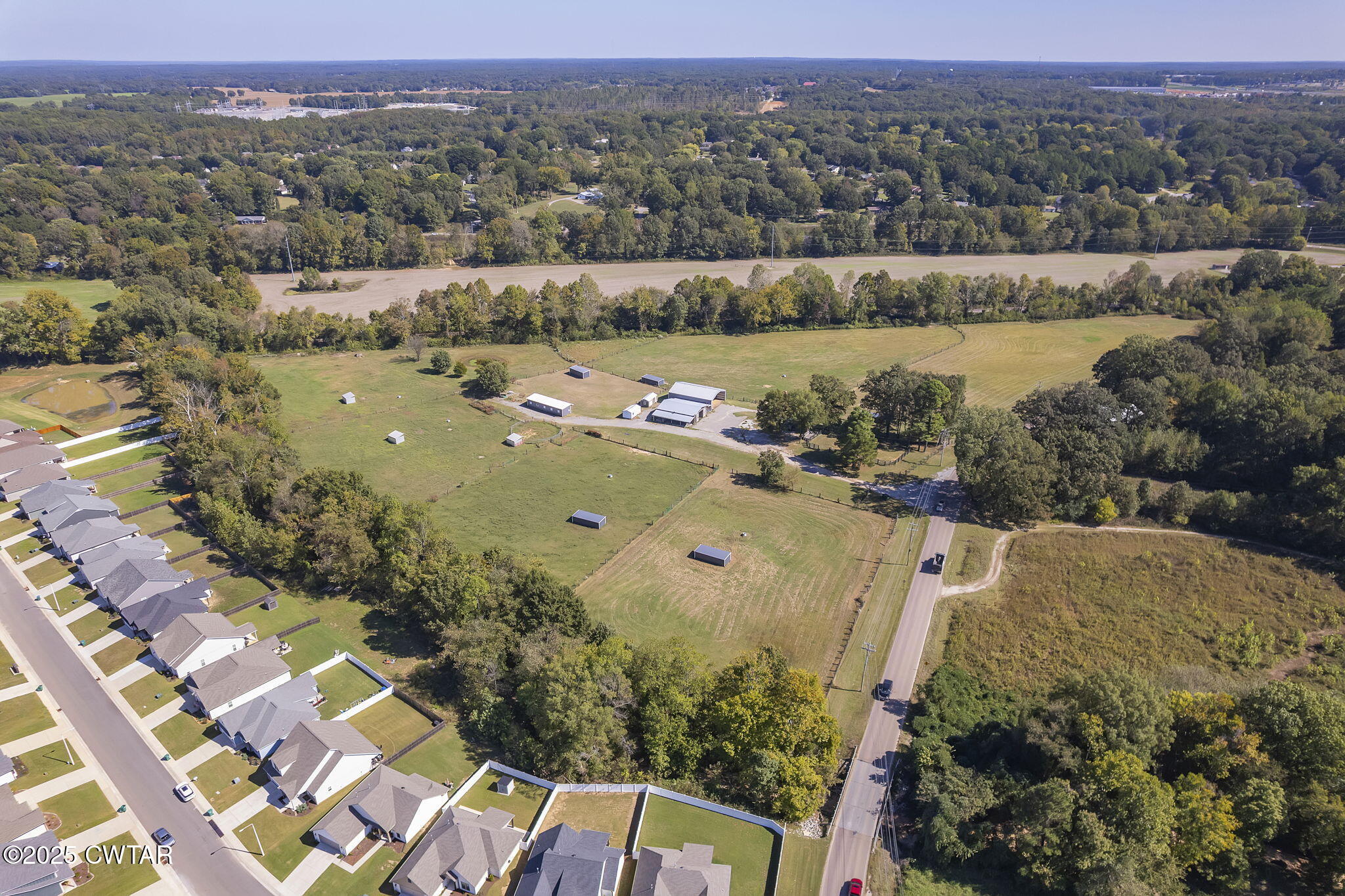 130 Cooper Anderson Road Jackson, TN 38305 - Photo 9 of 46 an aerial view of a houses with a yard