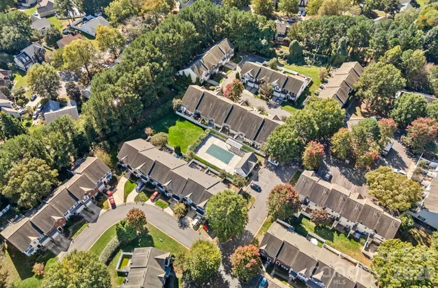 an aerial view of house with yard
