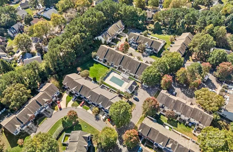 an aerial view of house with yard