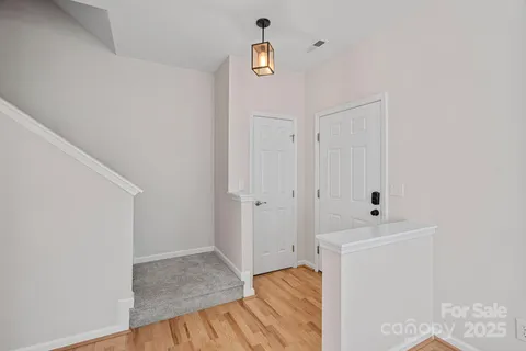 a view of a bedroom from the hallway