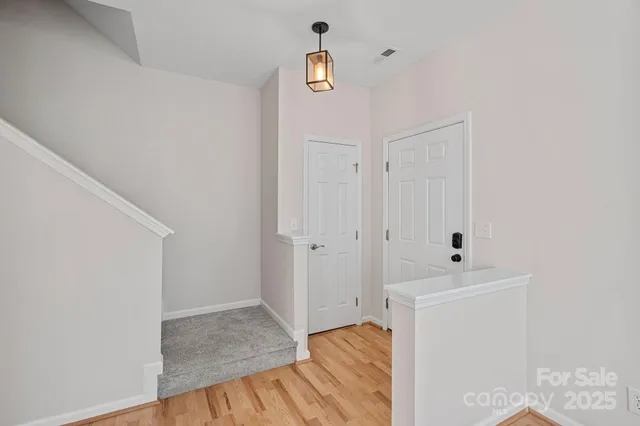 a view of a bedroom from the hallway