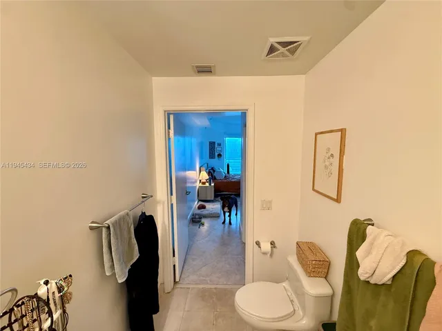a bathroom with a sink and toilet