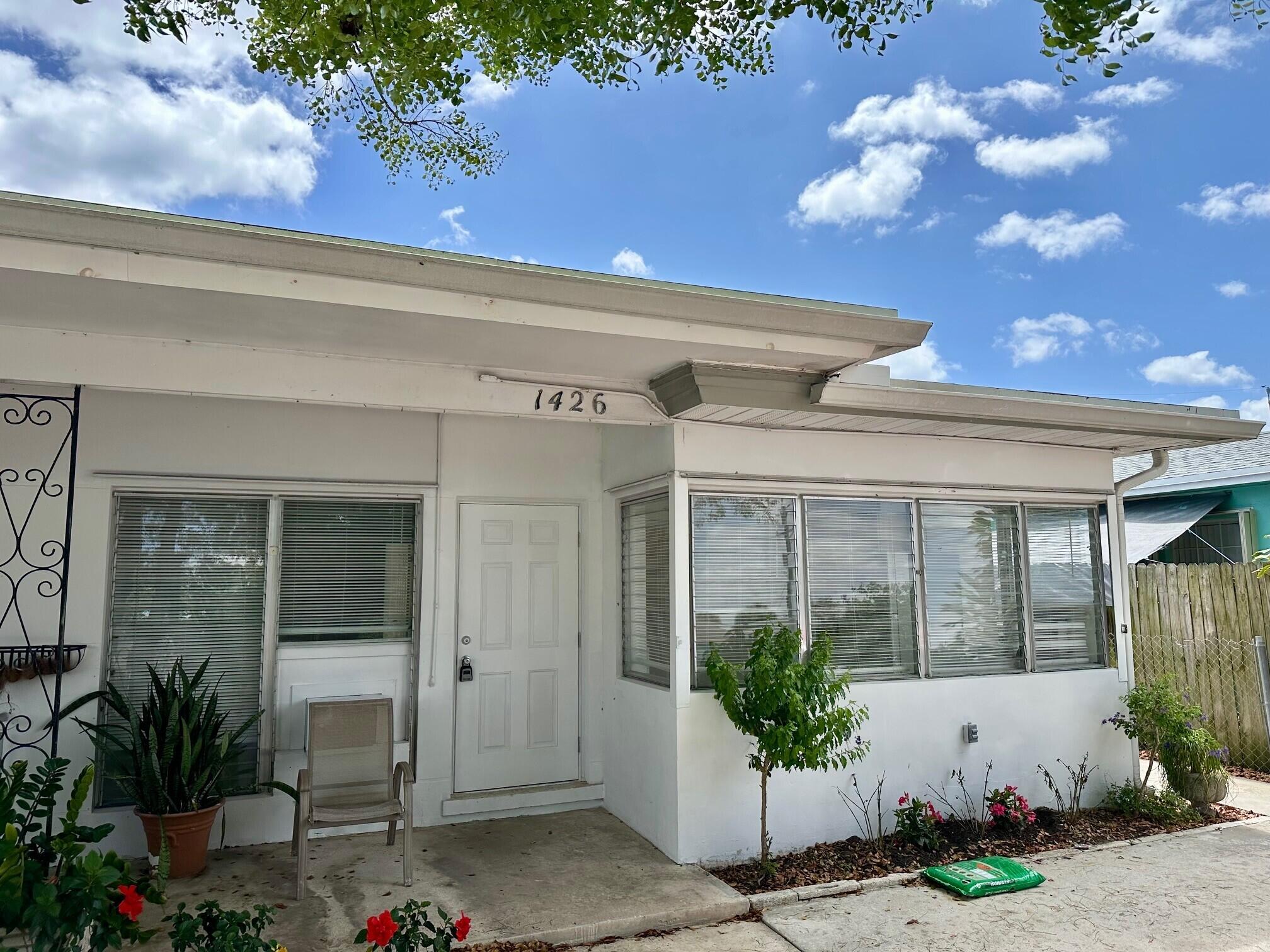 1426 North J Street, Unit 1 Lake Worth Beach, FL 33460 - Photo 1 of 9 a view of a entryway door front of house