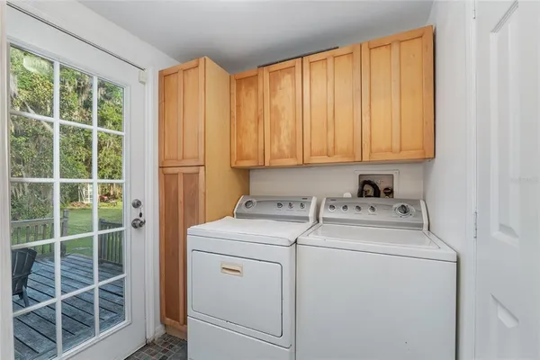 a bathroom with a sink vanity and a mirror
