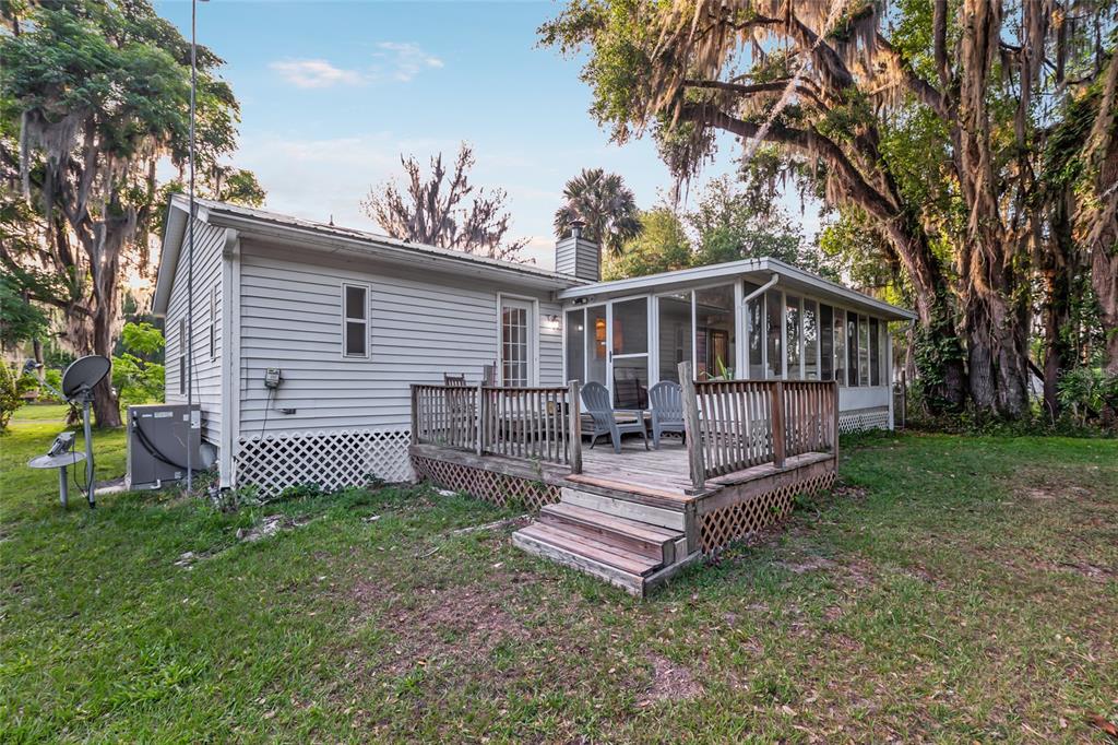20361 1st Street McIntosh, FL 32664 - Photo 56 of 62 a view of a backyard with a garden