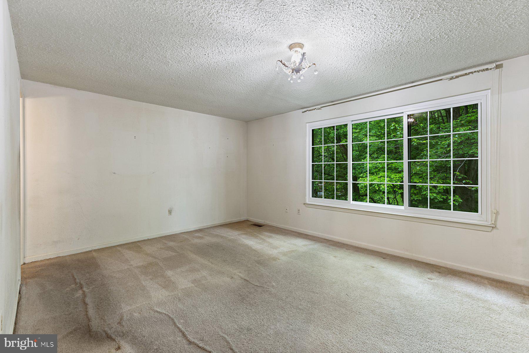 11337 Baroque Road Silver Spring, MD 20901 - Photo 14 of 29 an empty room with a window