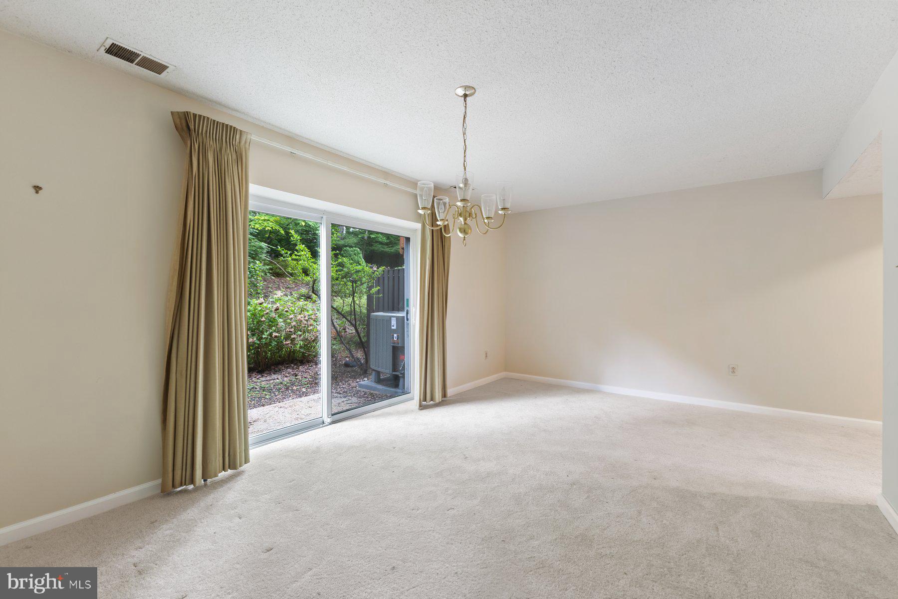 11337 Baroque Road Silver Spring, MD 20901 - Photo 27 of 29 a view of a room with windows and ceiling fan