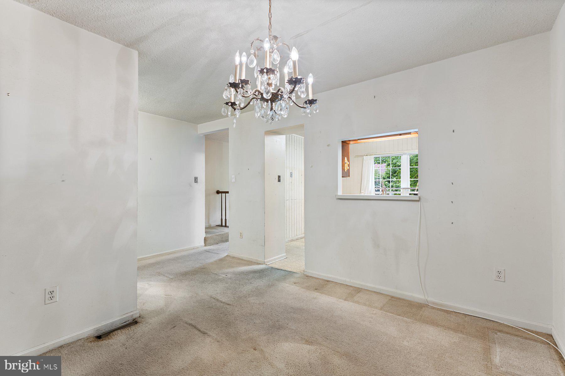 11337 Baroque Road Silver Spring, MD 20901 - Photo 7 of 29 a view of a chandelier in big room and chandelier