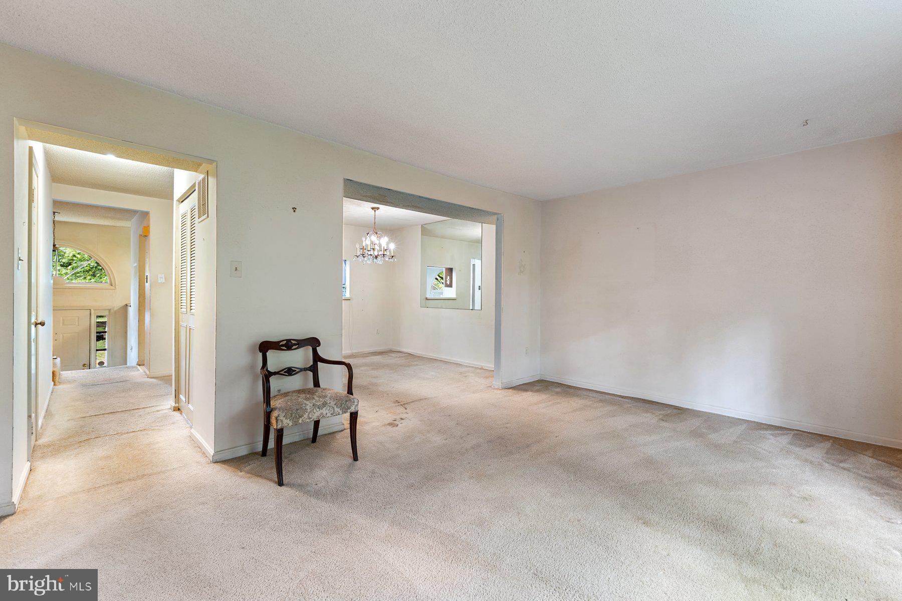 11337 Baroque Road Silver Spring, MD 20901 - Photo 9 of 29 an empty room with furniture and a window