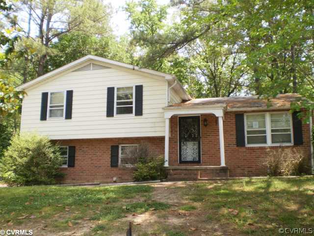 9506 Kendrick Road Richmond, VA 23236 - Photo 1 of 1 a front view of a house with a yard