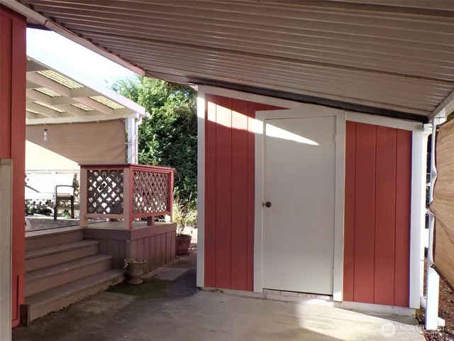 a view of a lake with houses in the back