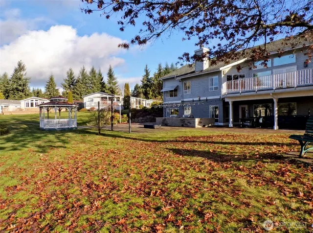 a bedroom with a bed and a desk