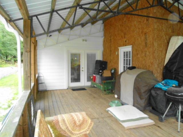 77 Perdue Road DeFuniak Springs, FL 32433 - Photo 15 of 34 ward back porch 2
