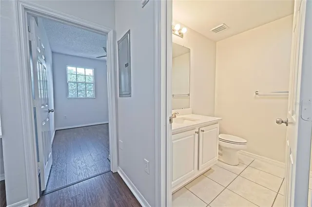 a swimming pool with outdoor seating and yard