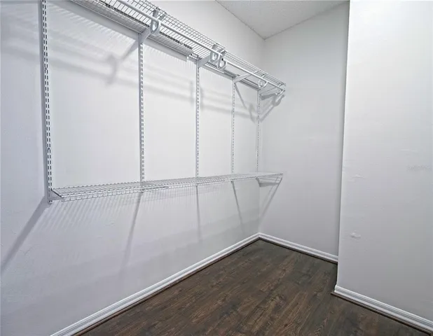 a view of a chairs and table in a patio