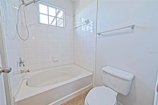 a front view of a building with garden