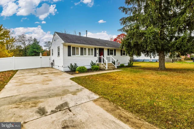 a front view of a house with swimming pool