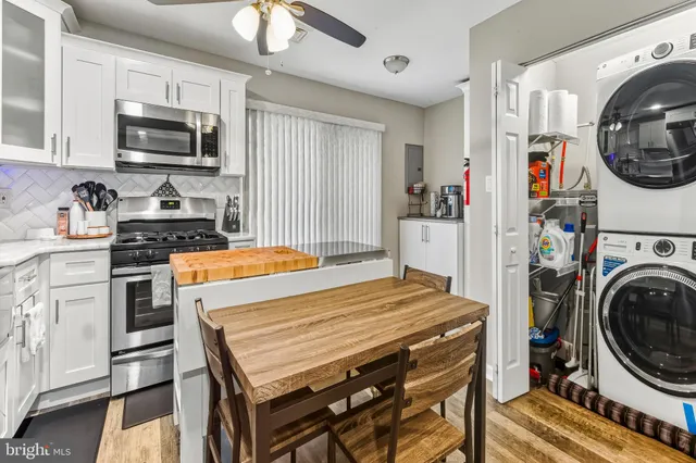 a kitchen with a stove and a sink