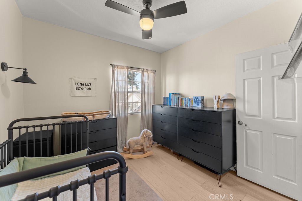 1145 Roswell Avenue, Unit 8A Long Beach, CA 90804 - Photo 18 of 35 a bedroom with furniture and a window