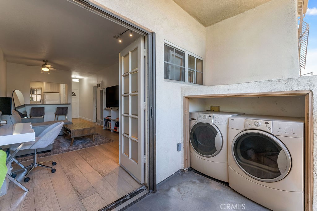 1145 Roswell Avenue, Unit 8A Long Beach, CA 90804 - Photo 21 of 35 a living room with furniture and a view of kitchen