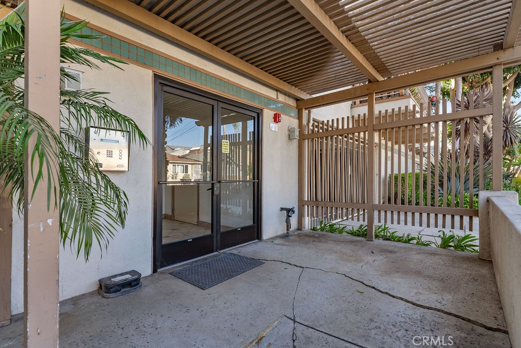 1145 Roswell Avenue, Unit 8A Long Beach, CA 90804 - Photo 25 of 35 a view of entryway with wooden floor