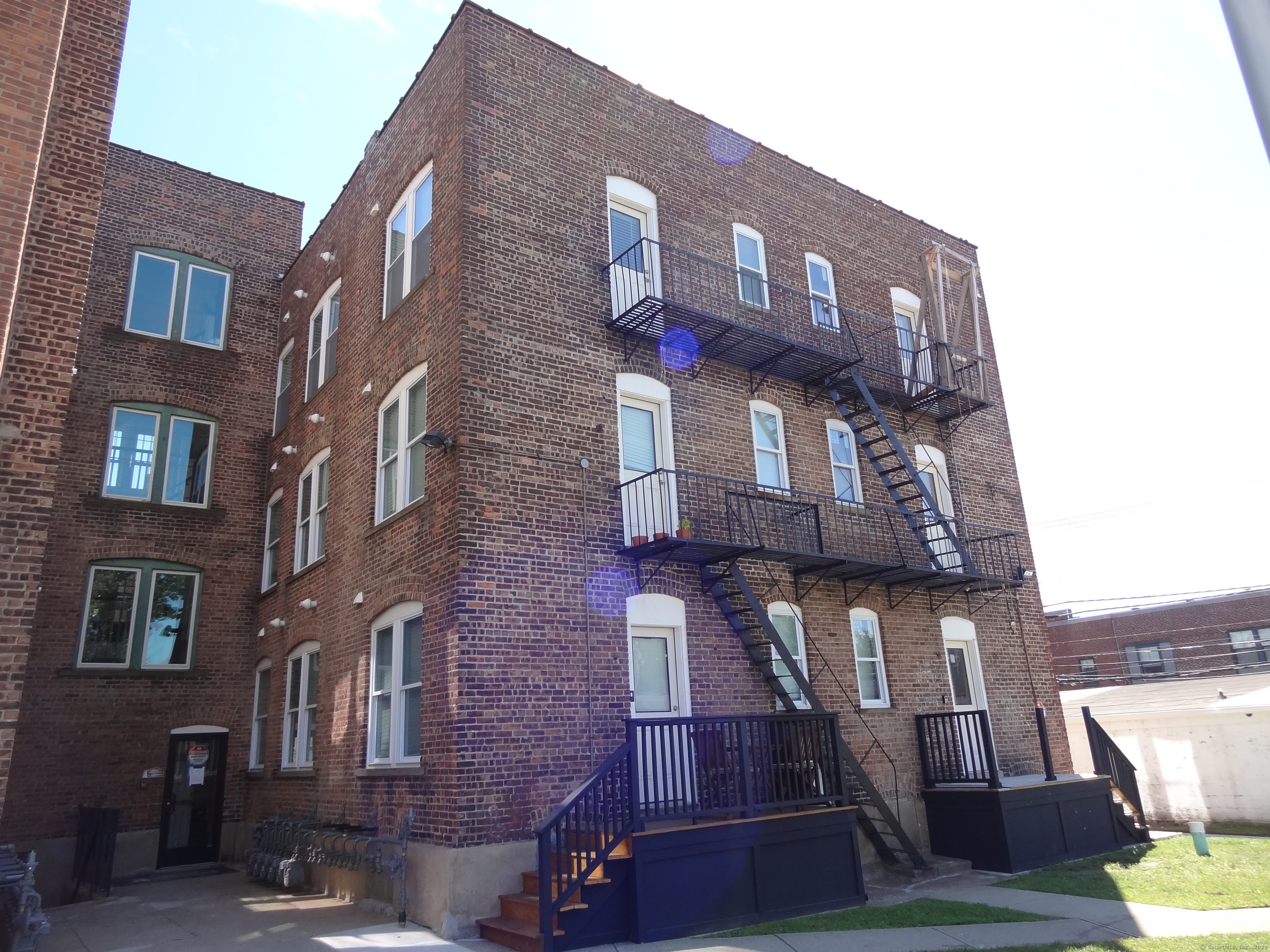 2806 Fairfield Avenue, Unit 307 Bridgeport, CT 06605 - Photo 19 of 24 a front view of a building with balcony